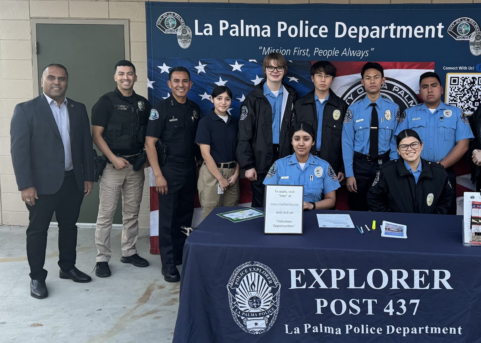 Nitesh Patel with La Palma police officers
